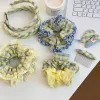 The new 2026 yellow and green checkered large intestine hair band exudes a sweet and elegant charm. It features a hair tie with elastic bands and a checkered hair tie details Picture